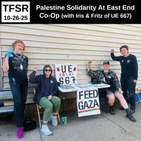 photo of members of UE667 next to a table with a sign reading Feed Gaza