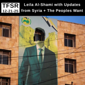 photo of a mural on the side of a multi-story building of Bashar Al-Assad with the face removed, plus "TFSR 12-21-25 | Leila Al-Shami with Updates from Syria + The Peoples Want"