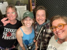a bunch of busy community organizers smile for the camera, excited to talk about the Asheville Tool Library