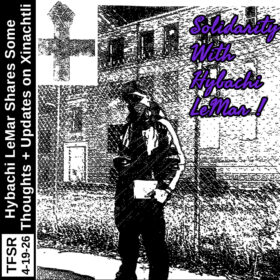 washed out black and white image of Hybachi in an adidas jumpsuit and mask holding lit in one hand, look at the camera from in front of a chainlink fence that divides foreground from a lawn and brick building in the bakcground. The image shows an anarchist black cross fist / cross, the words "Solidarity With Hybachi Lemar" and "TFSR 4-19-26 | Hybachi Lemar Shares Some Thoughts + Updates on Xinachtli”